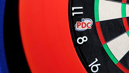 Transgender female darts player wins women's event, sparks fury