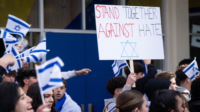 High school students walk out in protest after Jewish student was called names, attacked