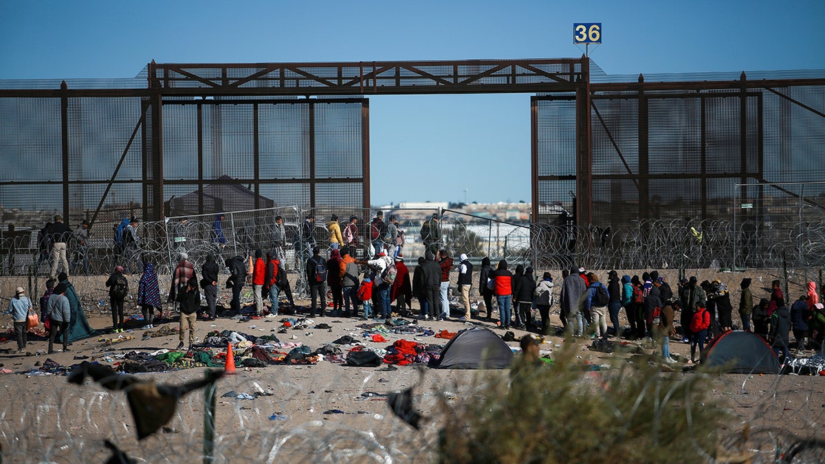 Migrants crossing the border