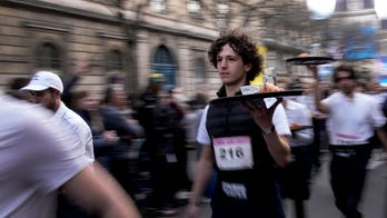 Paris waiters and waitresses dash to victory in revived 110-year-old racing tradition